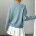 Women's floral sweater by FitiqueFit featuring a crew neck, long sleeves, and an elegant casual pullover design.