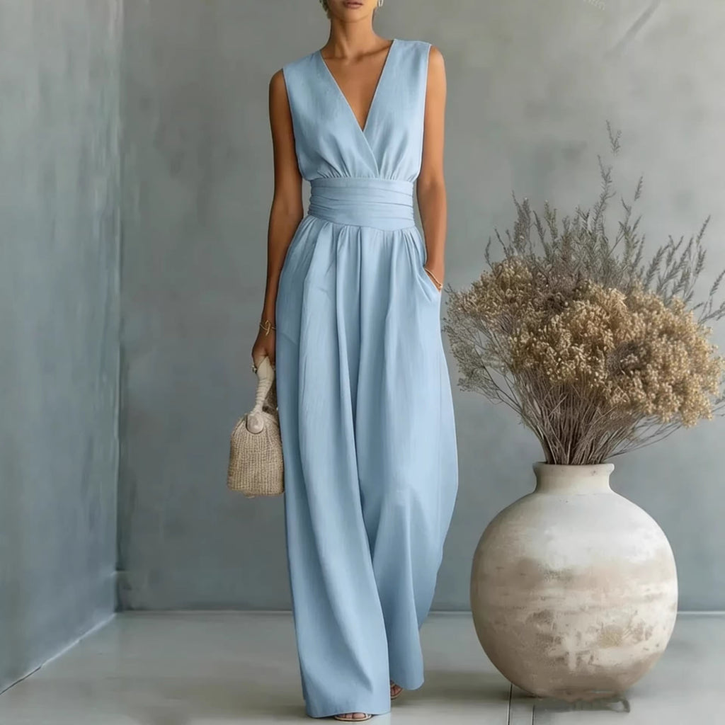 Women's elegant sleeveless V-neck jumpsuit with waist cinching and straight leg design, casualwear by Plush Fashion Hub.
