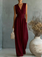 Women's elegant V-neck sleeveless jumpsuit with waist cinch and straight-leg design, casualwear by Plush Fashion Hub.