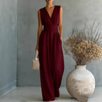 Elegant women's V-neck sleeveless jumpsuit with a waist-cinching fit and straight-leg design, ideal for casualwear by Plush Fashion Hub.