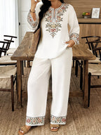 Women’s ethnic two-piece casualwear set with long sleeve shirt and cropped pants by FitiqueFit, featuring vibrant fabric and traditional design.