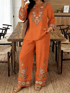 Women’s ethnic two-piece casualwear set with long sleeve shirt and cropped pants by FitiqueFit, shown in a stylish, vibrant design.