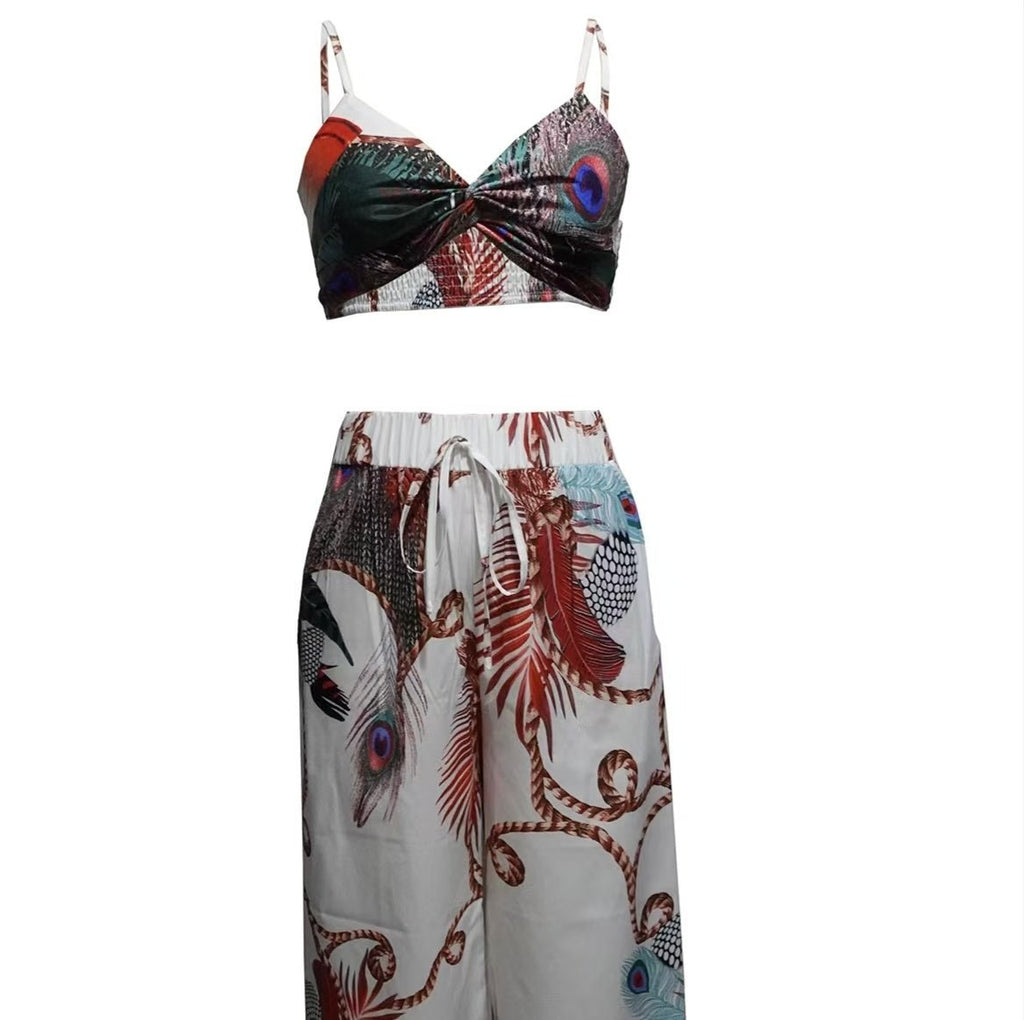 Women's feather print crop top and pants set by FitiqueFit, casual 2-piece vacation outfit with stylish, lightweight fabric.