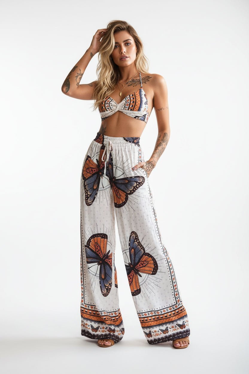 Women's feather print crop top and pants set by FitiqueFit, casual 2-piece vacation outfit with stylish lightweight fabric.