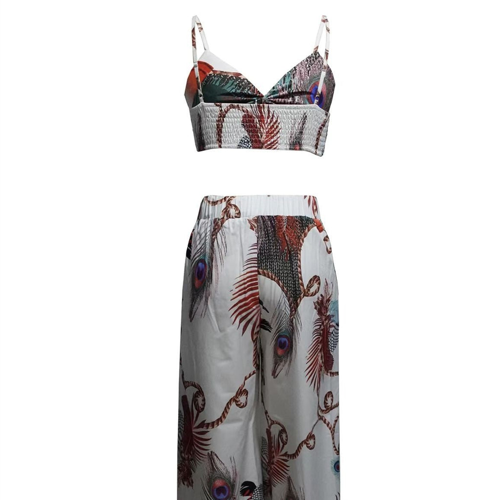 Women's feather print crop top and matching pants set, casualwear by FitiqueFit, perfect for vacation or relaxed outings.