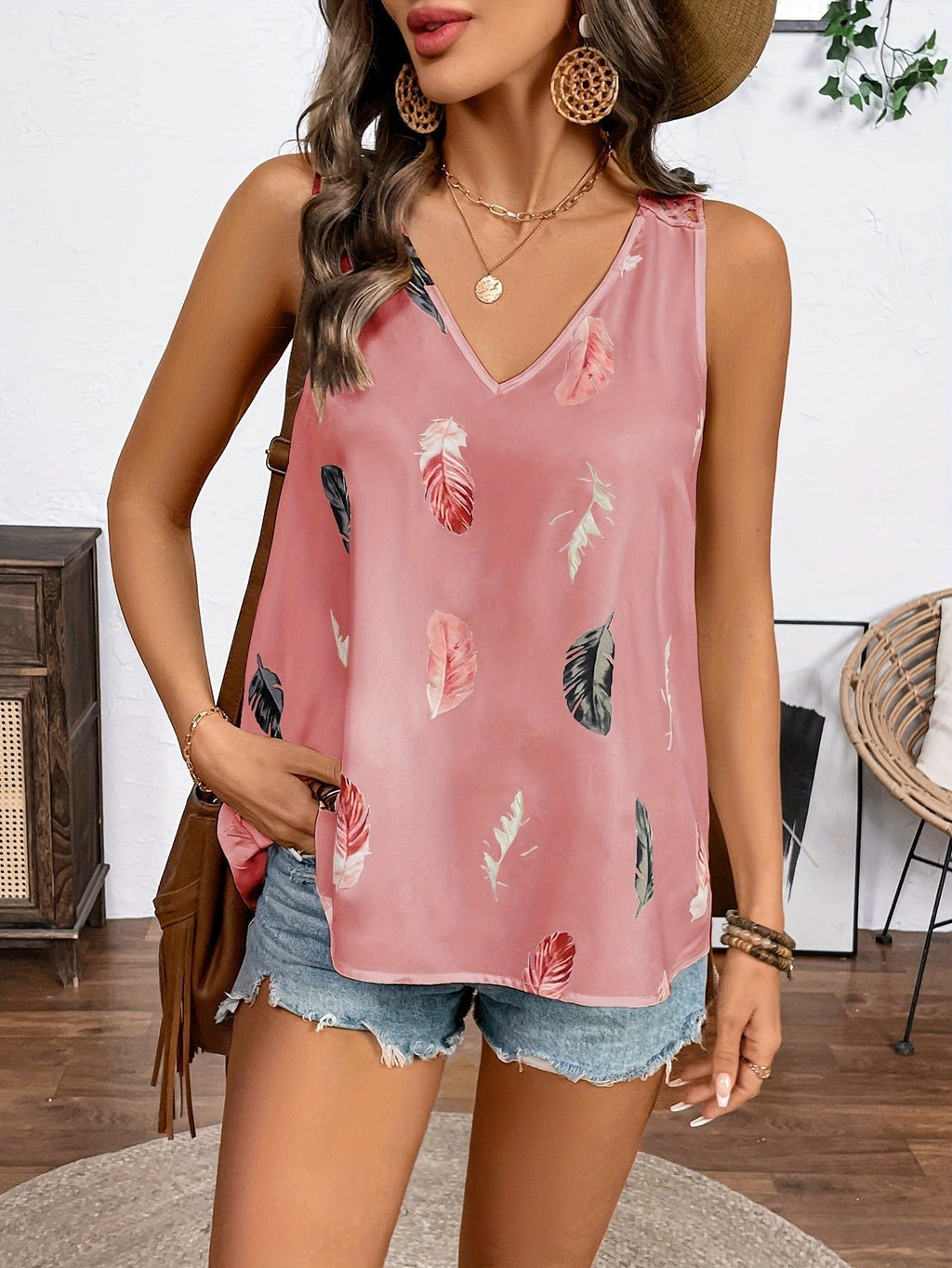 Women’s feather print V-neck camisole by FitiqueFit, casualwear top with lightweight fabric and stylish feather pattern.