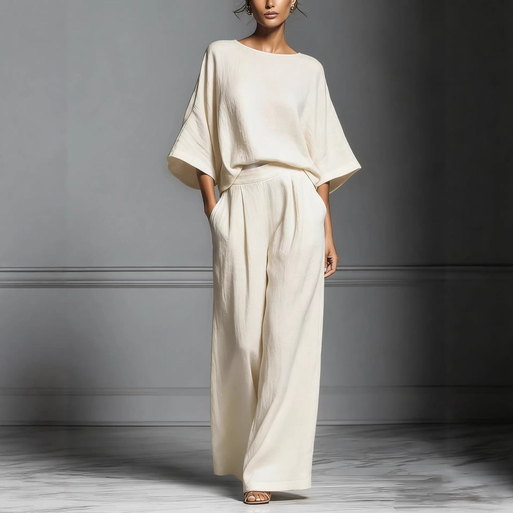 Women’s linen two-piece suit with flared sleeves, casualwear by FitiqueFit, shown on a model featuring a stylish relaxed fit.