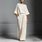 Women’s linen two-piece suit with flared sleeves, casualwear by FitiqueFit, shown on a model featuring a stylish relaxed fit.