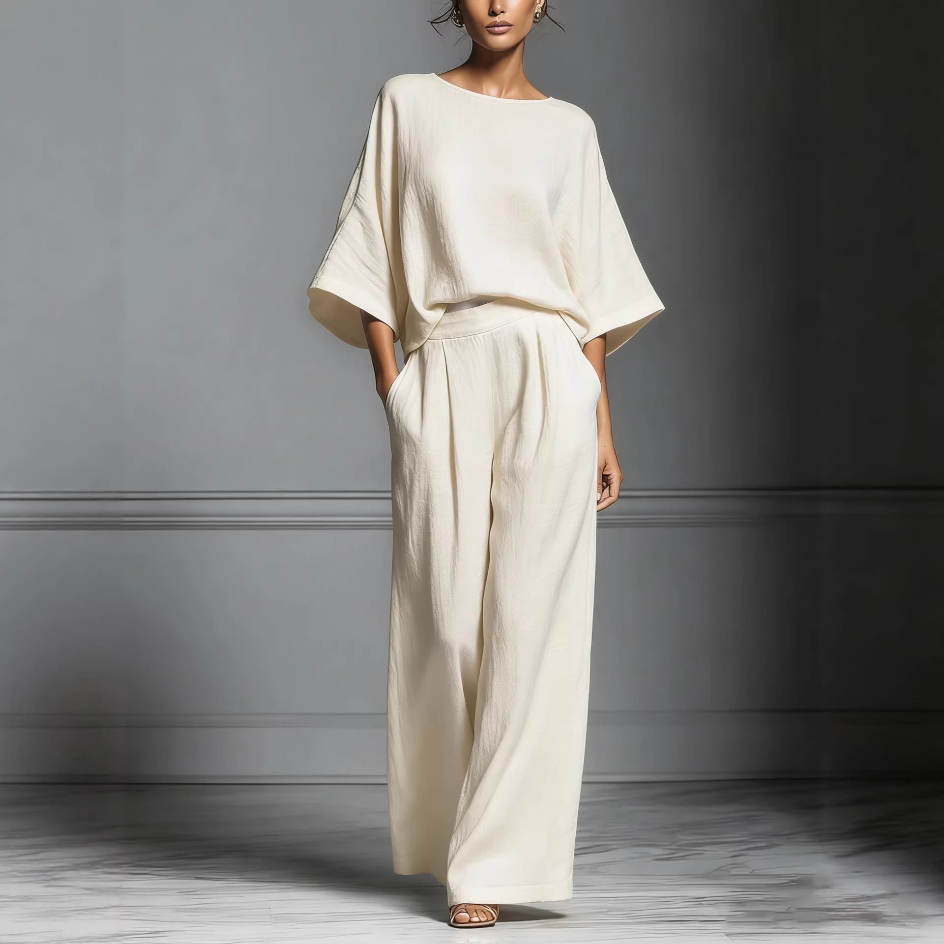 Women’s linen two-piece suit with flared sleeves, casualwear by FitiqueFit, shown on a model featuring a stylish relaxed fit.