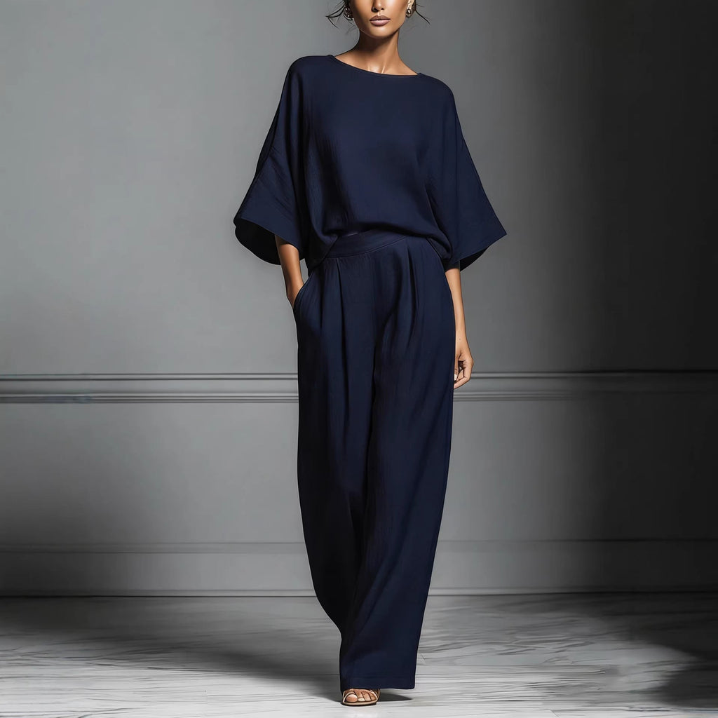 Women’s linen suit two-piece set with flared sleeves, casualwear by FitiqueFit, featuring a stylish relaxed fit and light linen fabric.