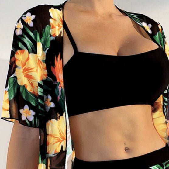 Women’s floral two-piece beach set by FitiqueFit featuring a breezy top and matching skirt for summer casualwear.