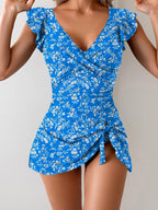 Women’s floral print one-piece swimsuit by FitiqueFit featuring a flattering casualwear style with vibrant flower patterns.