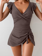 Women's floral print one-piece swimsuit by FitiqueFit, featuring a colorful pattern and casual beachwear style.