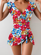 Women's floral print one-piece swimsuit by FitiqueFit, featuring a stylish casualwear design with vibrant floral patterns.