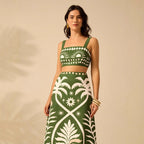 Women's floral printed camisole and high-waisted midi skirt set by FitiqueFit, shown on a model, perfect casualwear ensemble.