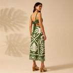 Women's floral printed camisole and high-waisted midi skirt set by FitiqueFit, featuring a casual, stylish look with vibrant floral design.