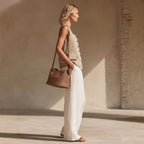 Women’s sleeveless cardigan top and long pants set by FitiqueFit, casualwear outfit with front buttons and relaxed fit.