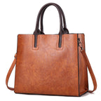 Elegant women's handbag by LadyShow.Store featuring a stylish design with top handles and a sleek finish.