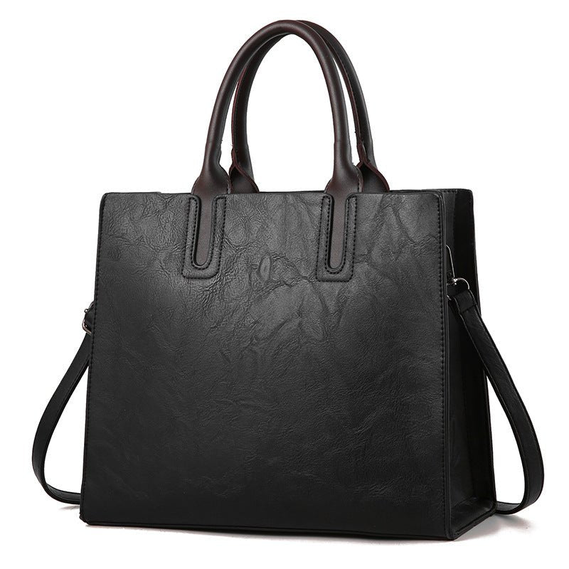 Elegant women's handbag by LadyShow.Store featuring a stylish design with top handles and spacious interior.