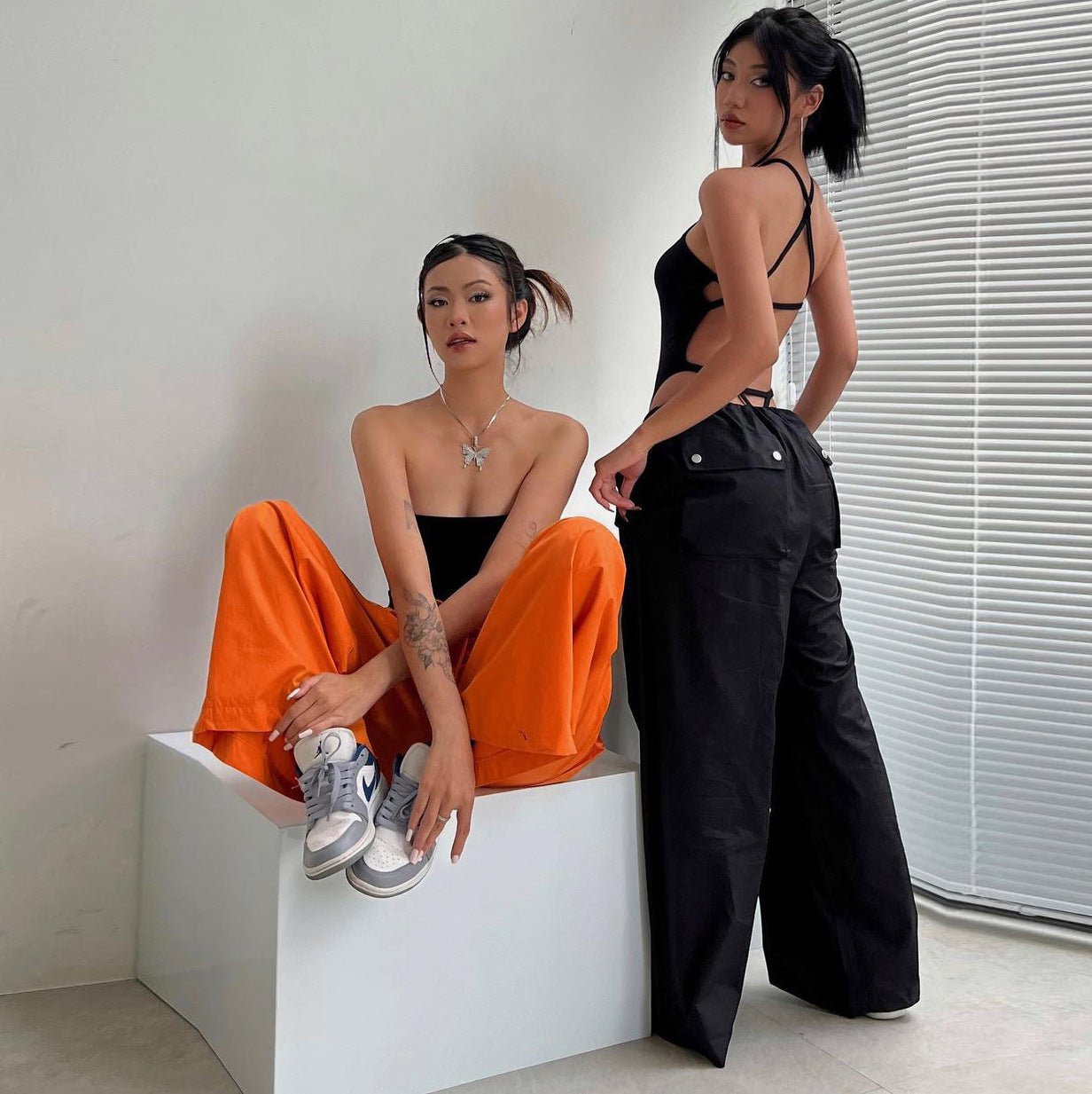 Women's high-waist lace-up straight-leg cargo pants by FitiqueFit, featuring a loose fit and casualwear style.