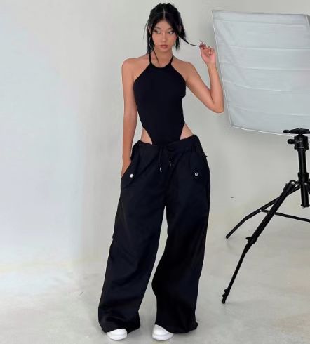Women's high-waist lace-up straight-leg cargo pants in loose fit, casualwear by FitiqueFit, shown on a model.