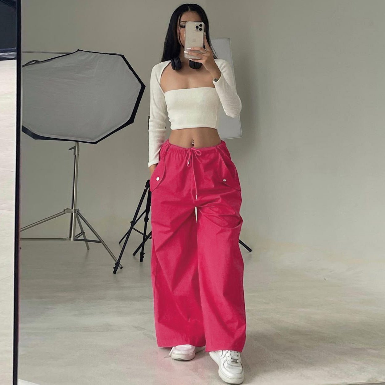 Women's high-waist lace-up cargo pants by FitiqueFit, featuring straight-leg design and a loose, casual fit.
