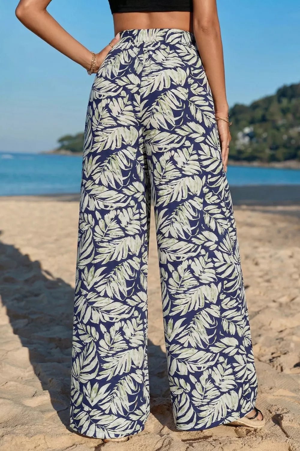 Women's high-waist leaf print wide-leg cotton blend pants from Plush Fashion Hub, casual and comfortable for everyday wear.