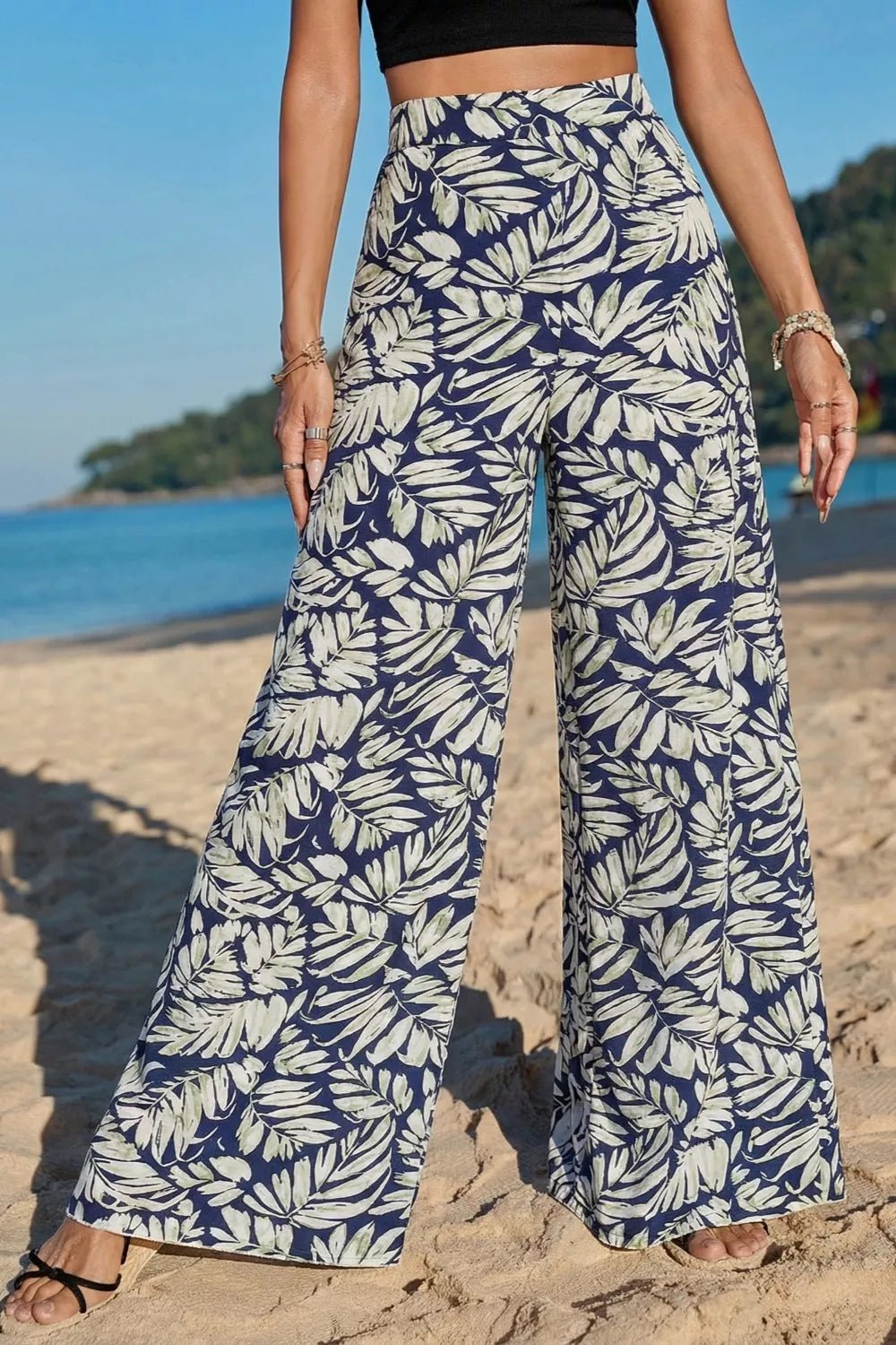 Women's high-waist leaf print wide-leg cotton blend pants by Plush Fashion Hub, casual and comfortable with a stylish design.