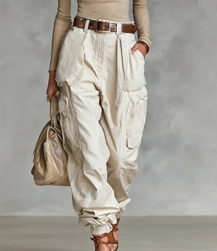 Women’s high-waist loose fit wide-leg casual trousers by FitiqueFit, shown styled with a tucked-in top and casual shoes.