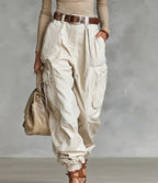 Women’s high-waist loose fit wide-leg casual trousers by FitiqueFit, shown styled with a tucked-in top and casual shoes.