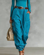 Women’s high-waist loose-fit wide-leg casual trousers by FitiqueFit, shown in a relaxed, comfortable fit on a model.