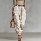 Women’s high-waist loose-fit wide-leg casual trousers by FitiqueFit, shown styled with a casual top and sneakers.