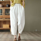 Women's high-waist solid-color Capri harem pants by FitiqueFit, casualwear with relaxed fit and comfortable harem style.