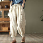 Women's high-waist solid-color harem capri pants from FitiqueFit, featuring a relaxed casualwear style and comfortable fit.