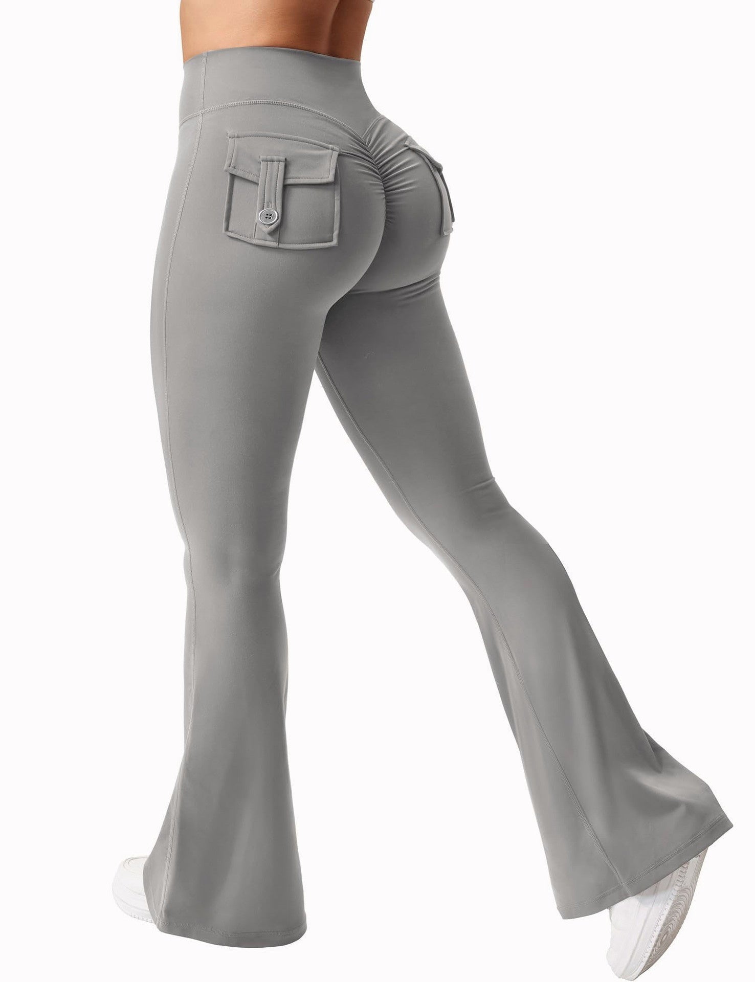 Women's high-waisted cargo pocket workout leggings by FitiqueFit, featuring a comfortable fit and practical side pockets for casual wear.