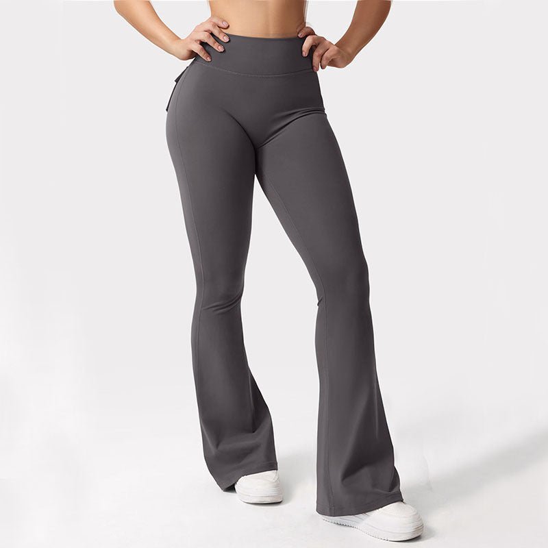 Black women's high-waisted cargo pocket workout leggings by FitiqueFit, showcasing a comfortable casualwear style with functional pockets.