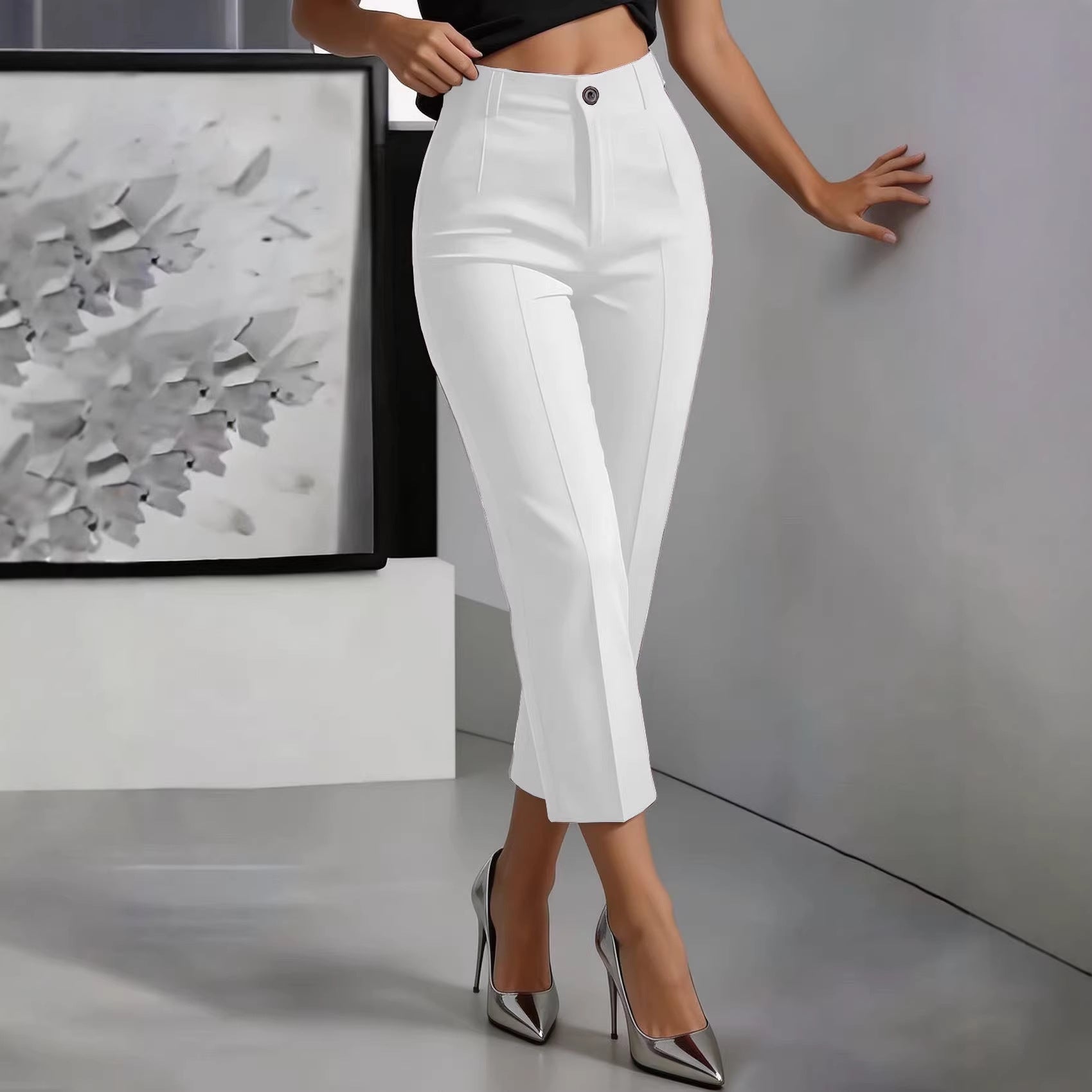 Women’s high-waisted straight-leg pants in a drapey cropped fit, casualwear from FitiqueFit, shown on a model.