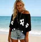 Women's loose knit drop-shoulder top with hollow-out design, casualwear by FitiqueFit, shown in a relaxed fit style.