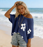 Women’s loose knit casual top with hollow-out design and drop-shoulder style, by FitiqueFit, displayed on a mannequin.