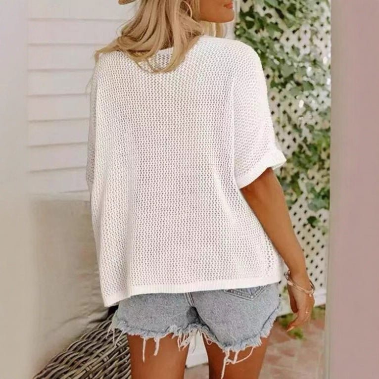 Women's loose knit casual top with hollow-out design and drop shoulders by FitiqueFit, shown on a model.
