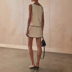 Women's casual sleeveless vest top and high-waist midi skirt set by FitiqueFit, featuring an irregular design and stylish 2-piece ensemble.