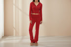 Women’s knitted hooded two-piece set with cardigan and high-waisted pants, from FitiqueFit, styled for casual comfort.