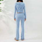 Women’s knitted hooded cardigan and high-waisted pants set by FitiqueFit, featuring a cozy, stylish two-piece knit outfit.