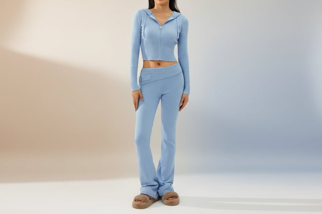 Women’s knitted hooded two-piece set with cardigan and high-waisted pants from FitiqueFit, featuring cozy knit fabric and casual style.
