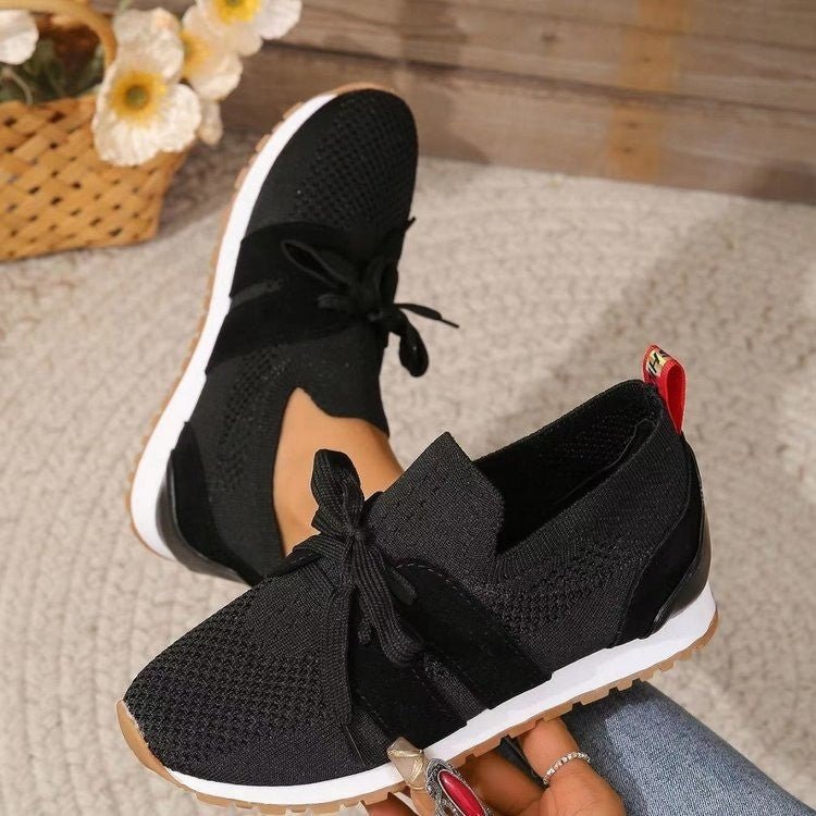 Women’s lace-up mesh walking flats by FitiqueFit, showing breathable fabric and comfortable slip-on footwear for women.
