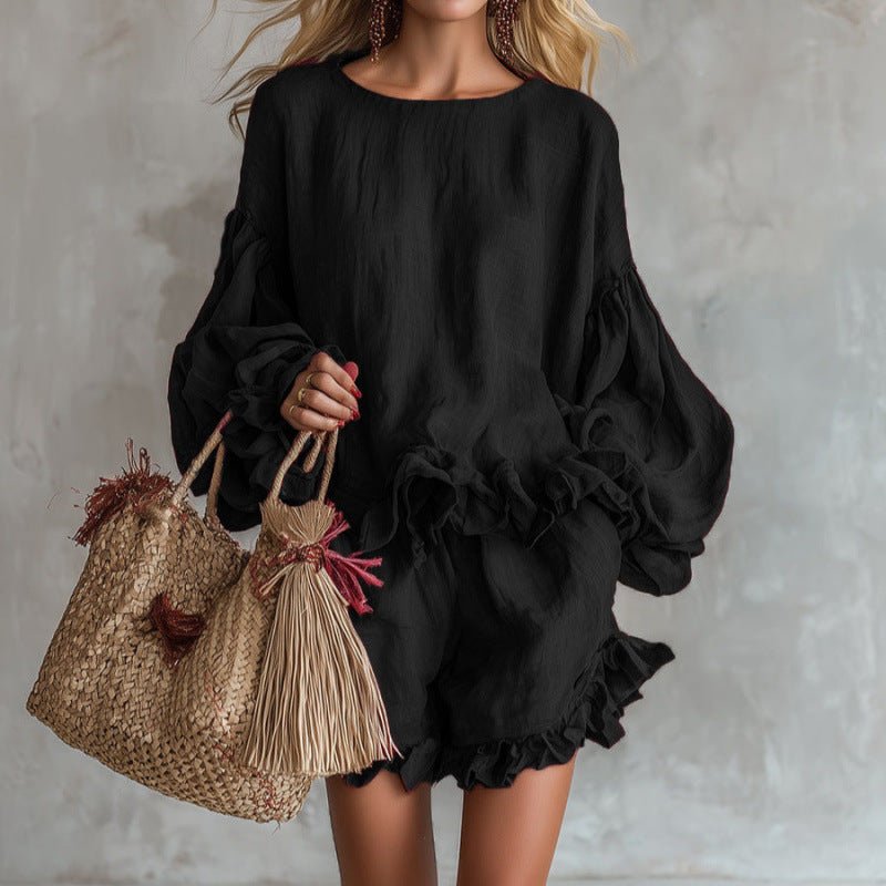 Women's loose fit lantern sleeve top and shorts two-piece set by FitiqueFit, casualwear style, shown on a model.