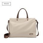 LadyShow.Store women's laptop bag, casual business tote with large capacity, showing multiple compartments and sturdy handles.