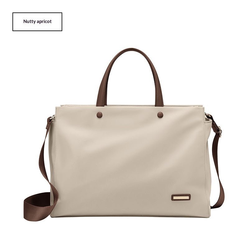 LadyShow.Store women's laptop bag, casual business tote with large capacity, showing multiple compartments and sturdy handles.