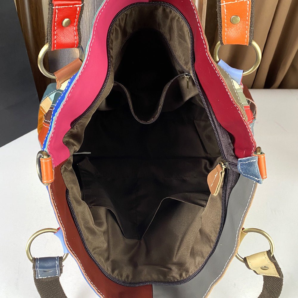 Large genuine leather women's crossbody bag with nautical-style design, featuring spacious compartments and stylish details.