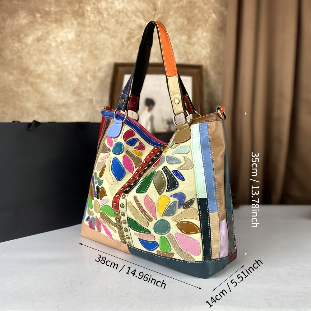Genuine leather women's large-capacity crossbody bag with nautical-style design, featuring adjustable strap and spacious interior.
